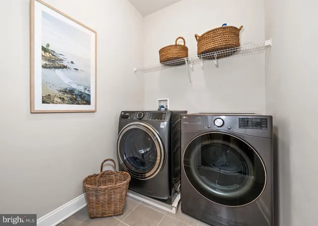 a balcony with wooden floor and fence