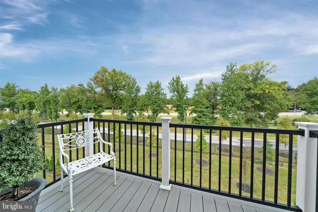 a bathroom with double sink and a mirror