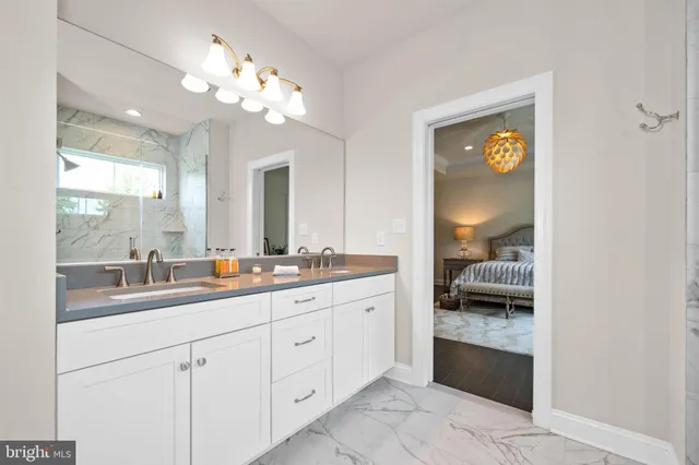 a living room with lots of furniture and clothes