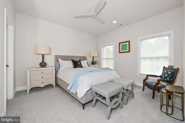 a bedroom with a bed and furniture