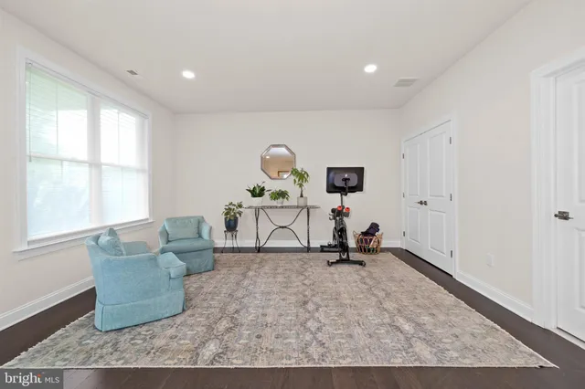 a living room with furniture window and a table