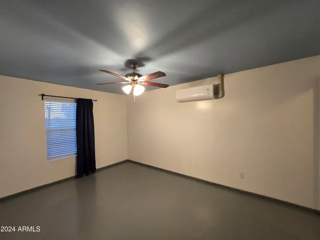 a view of a livingroom with a fan