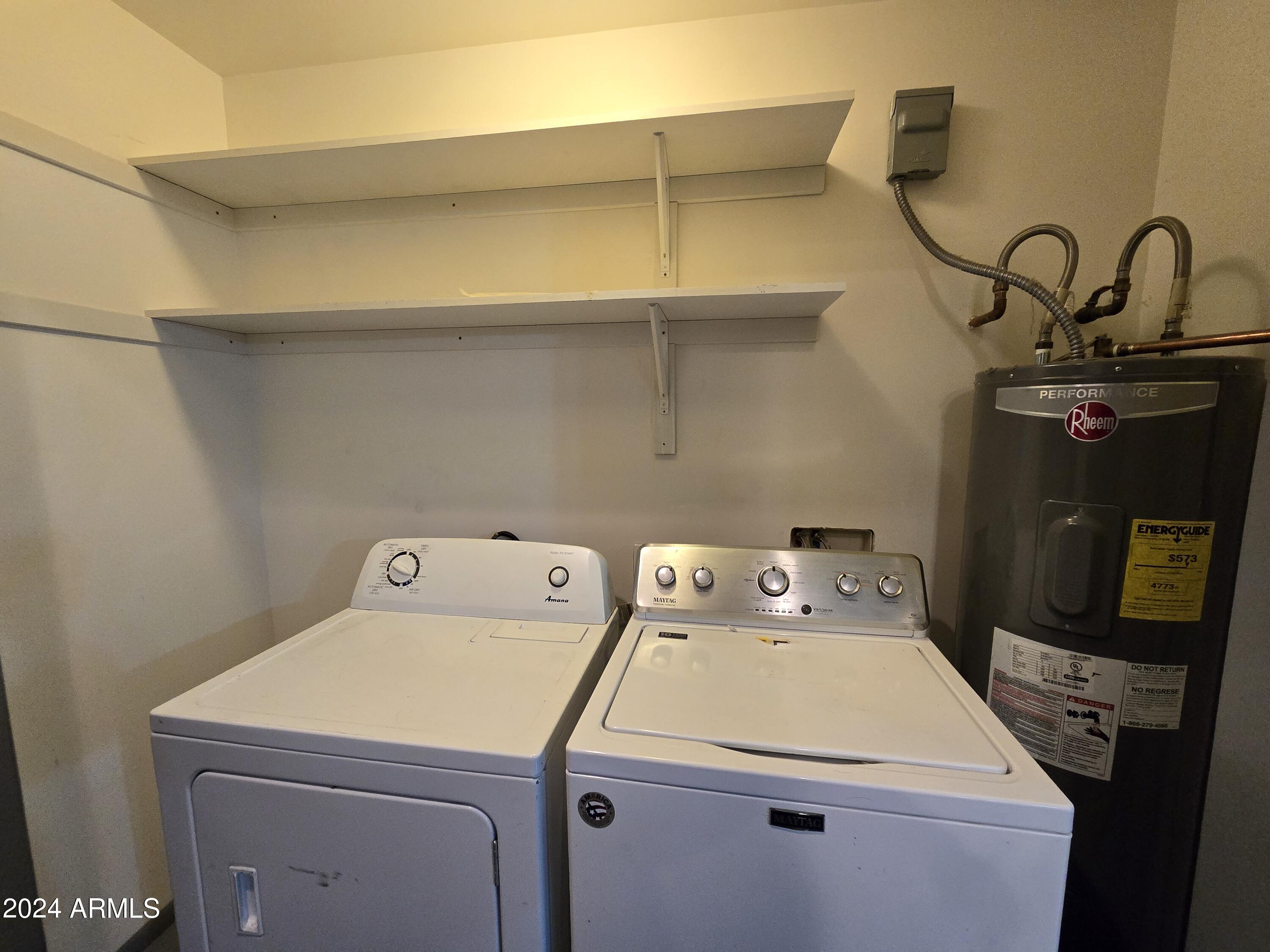 2302 North 36th Street, Unit 2 Phoenix, AZ 85008 - Photo 8 of 11 a utility room with dryer and washer
