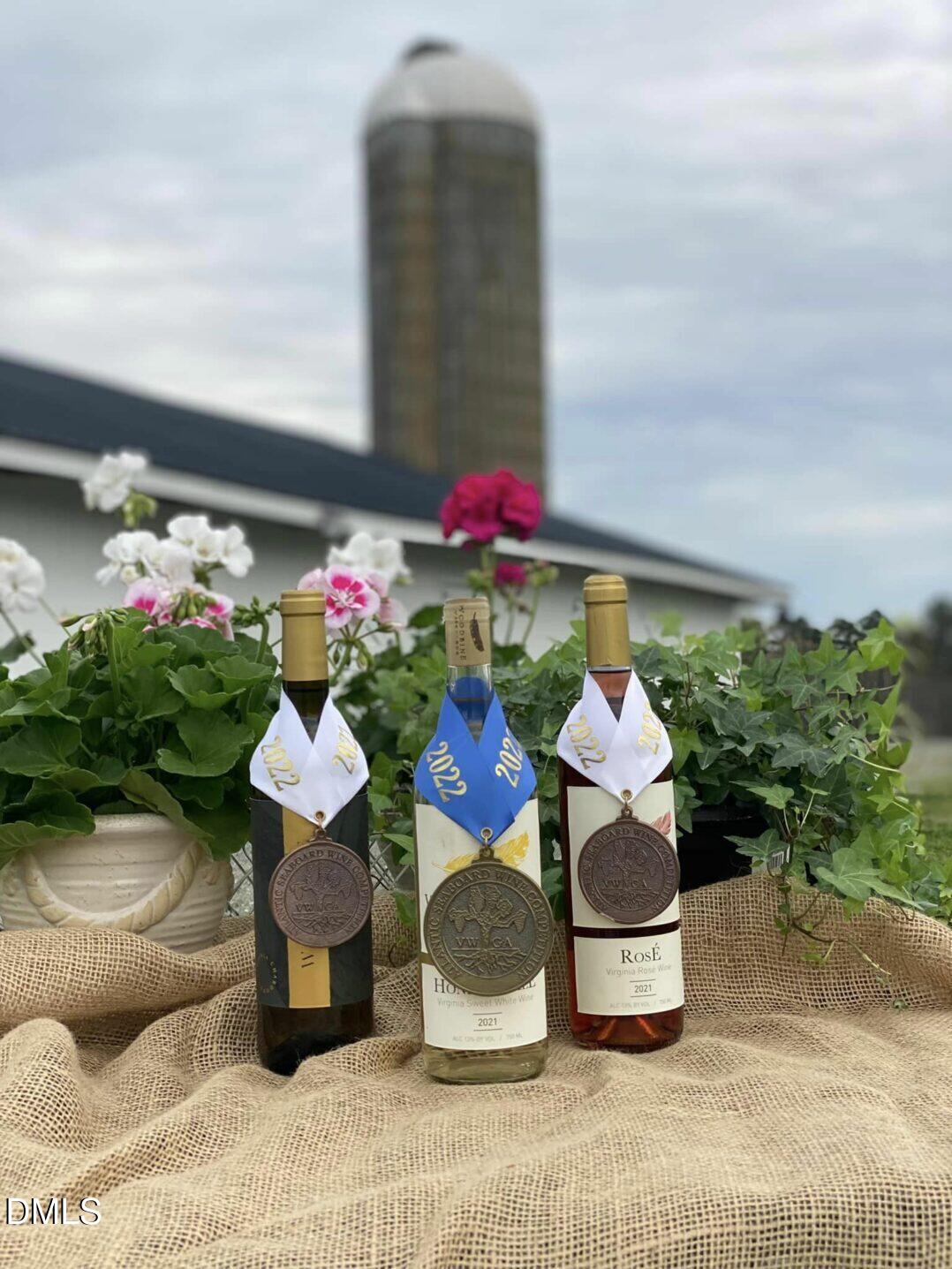 1638 Kingswood Road Buffalo Junction, VA 24529 - Photo 14 of 15 a front view of a house with lots of flowers