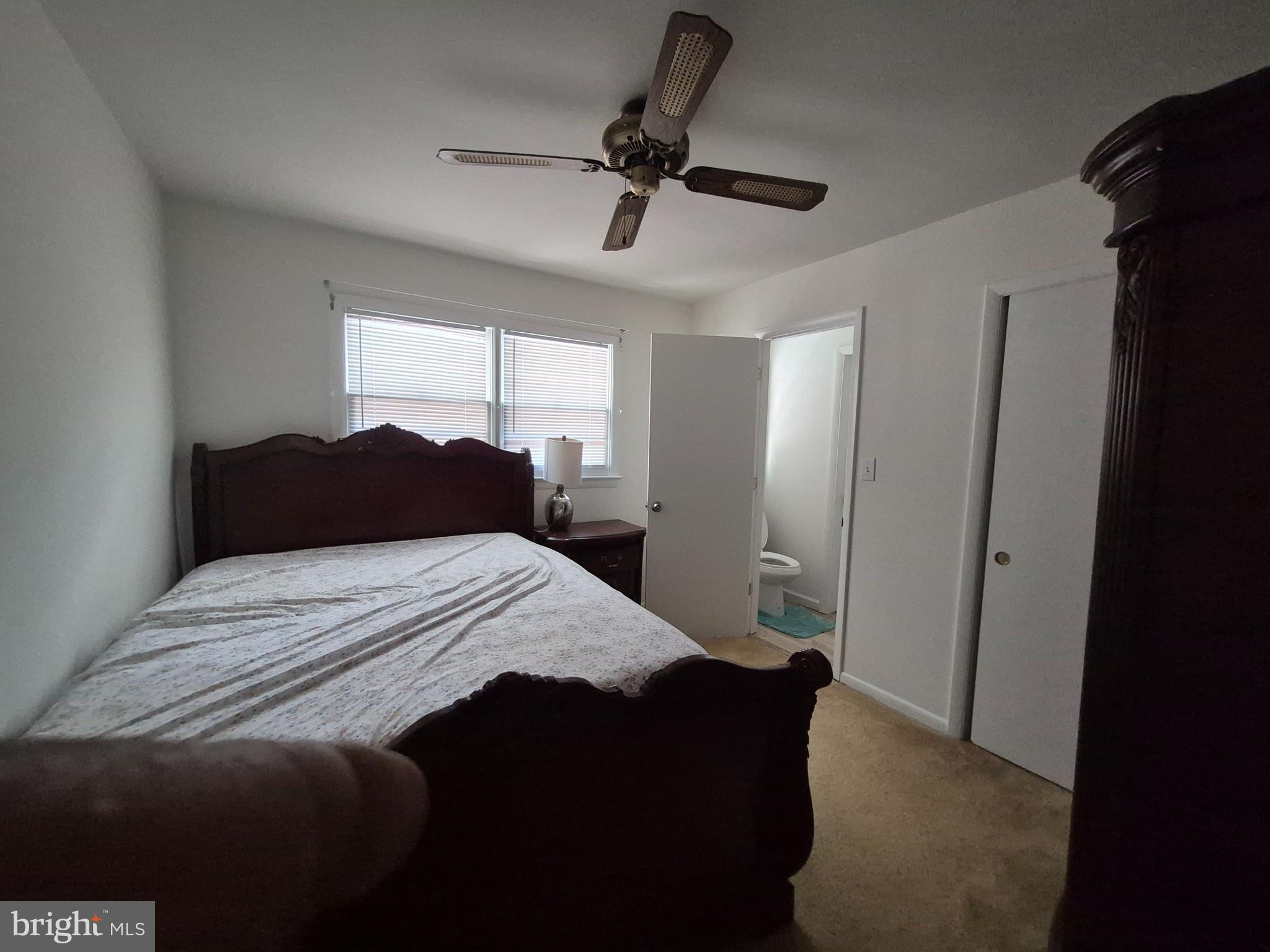 707 West Morris Leonard Road Salisbury, MD 21804 - Photo 13 of 22 a bedroom with a bed and a window
