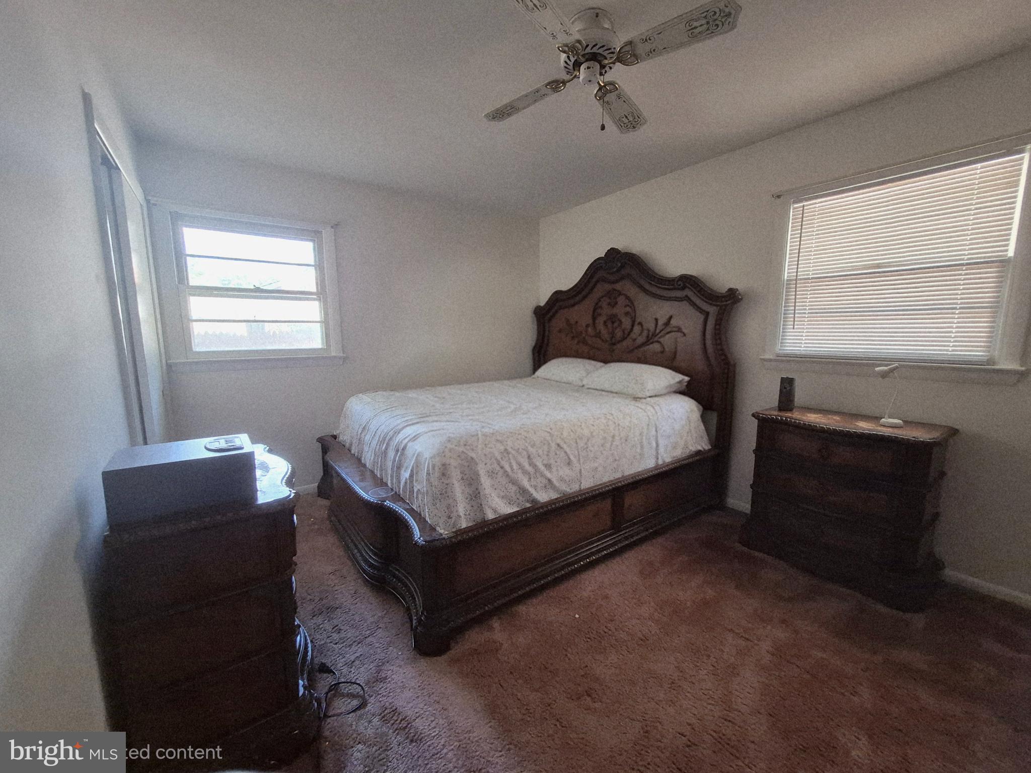 707 West Morris Leonard Road Salisbury, MD 21804 - Photo 15 of 22 a bedroom with a bed and window