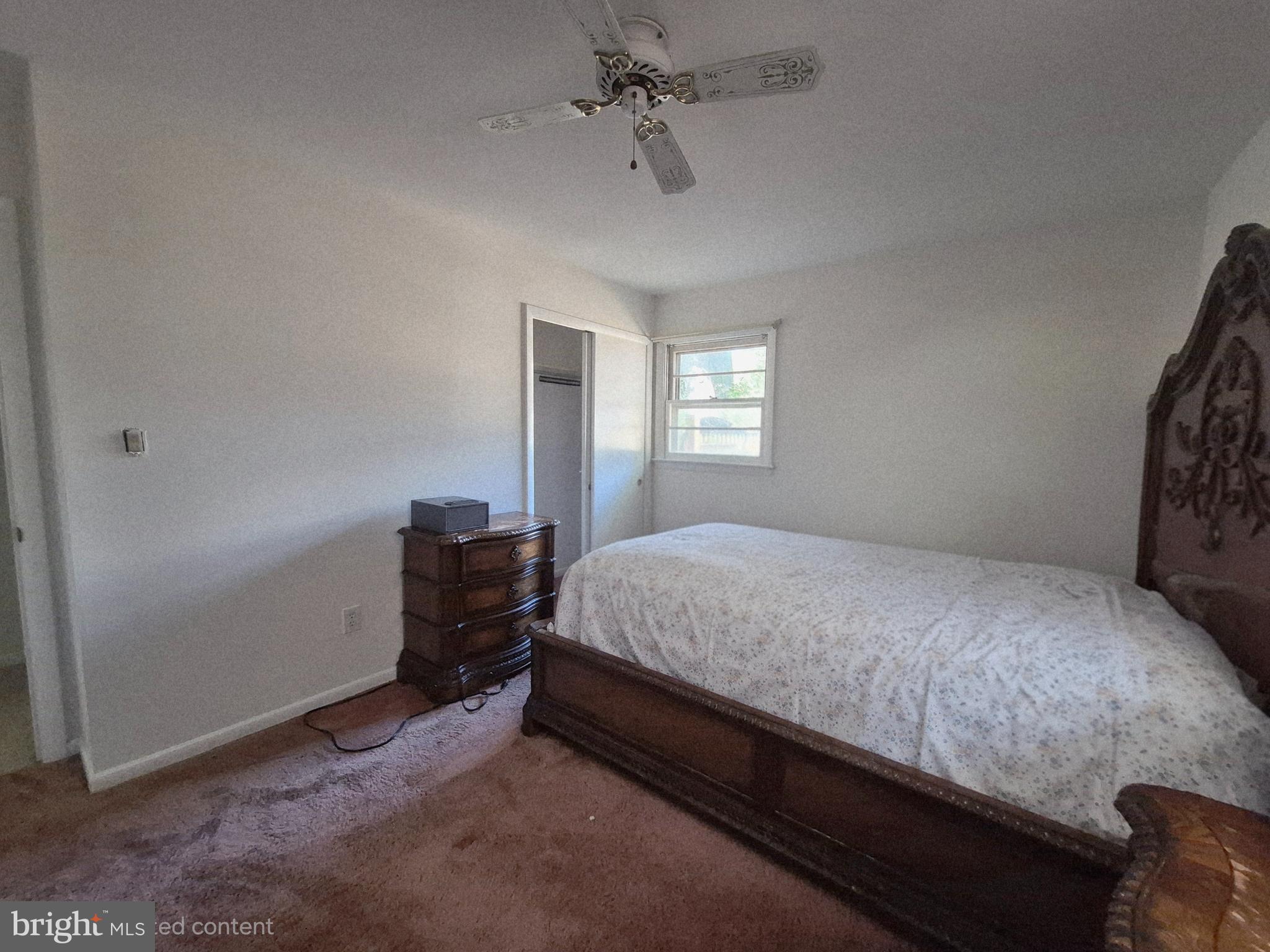 707 West Morris Leonard Road Salisbury, MD 21804 - Photo 16 of 22 a bedroom with a bed and a window