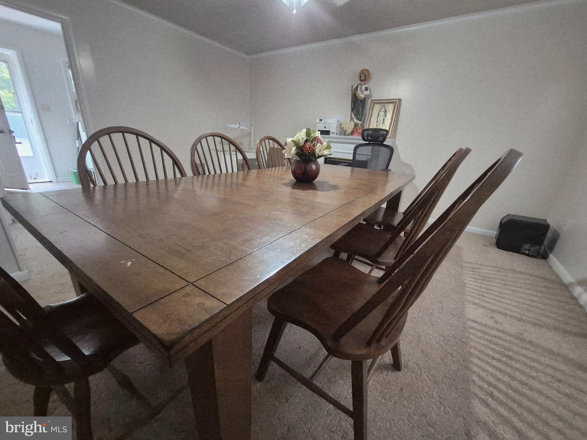 707 West Morris Leonard Road Salisbury, MD 21804 - Photo 7 of 22 a dining room with furniture and wooden floor