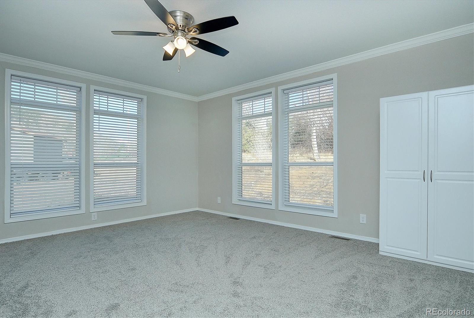 16554 Rocky Mountain Road Salida, CO 81201 - Photo 25 of 33 a view of empty room with ceiling fan