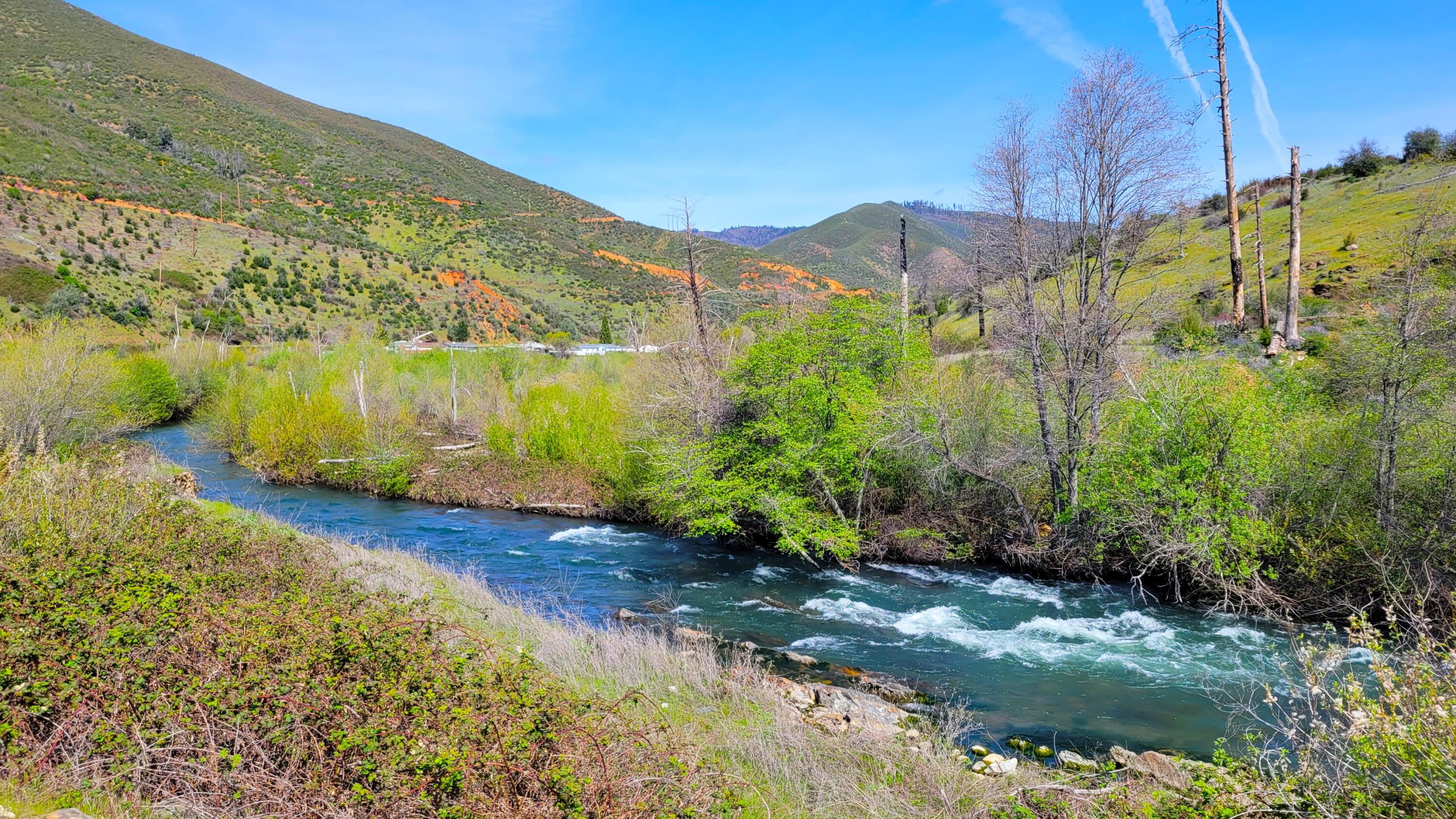 a view of a lake with a mountain