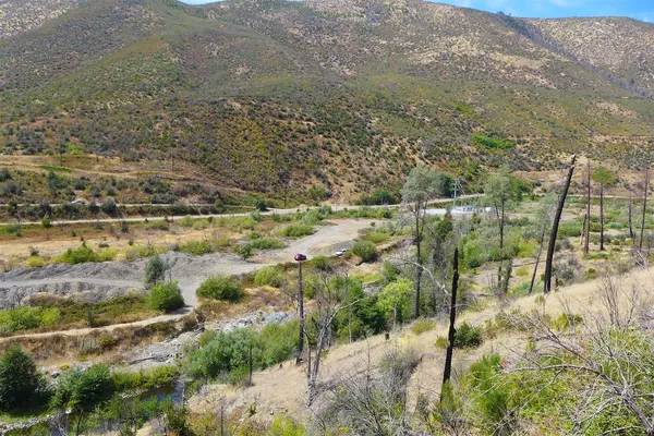 a view of a lake with lots of trees