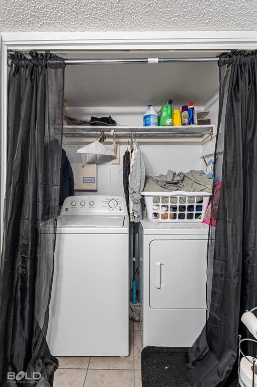 3100 Fairfield Avenue, Unit 10D Shreveport, LA 71104 - Photo 20 of 28 a utility room with dryer and washer