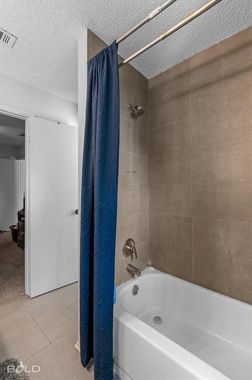 3100 Fairfield Avenue, Unit 10D Shreveport, LA 71104 - Photo 24 of 28 a bathroom with a bathtub and a shower