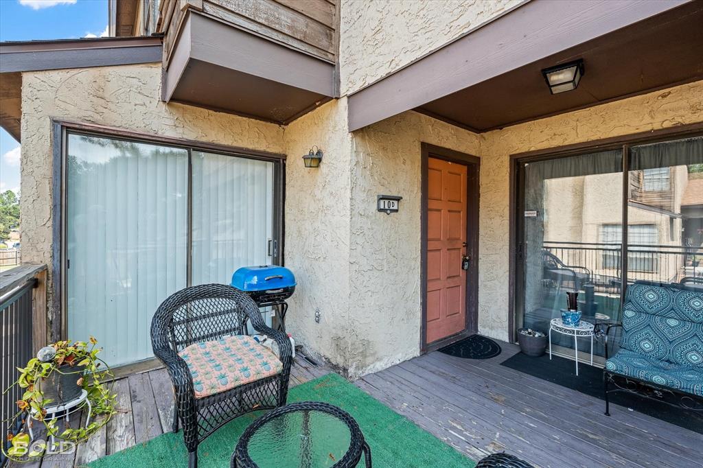 3100 Fairfield Avenue, Unit 10D Shreveport, LA 71104 - Photo 5 of 28 a view of a two chairs in the patio