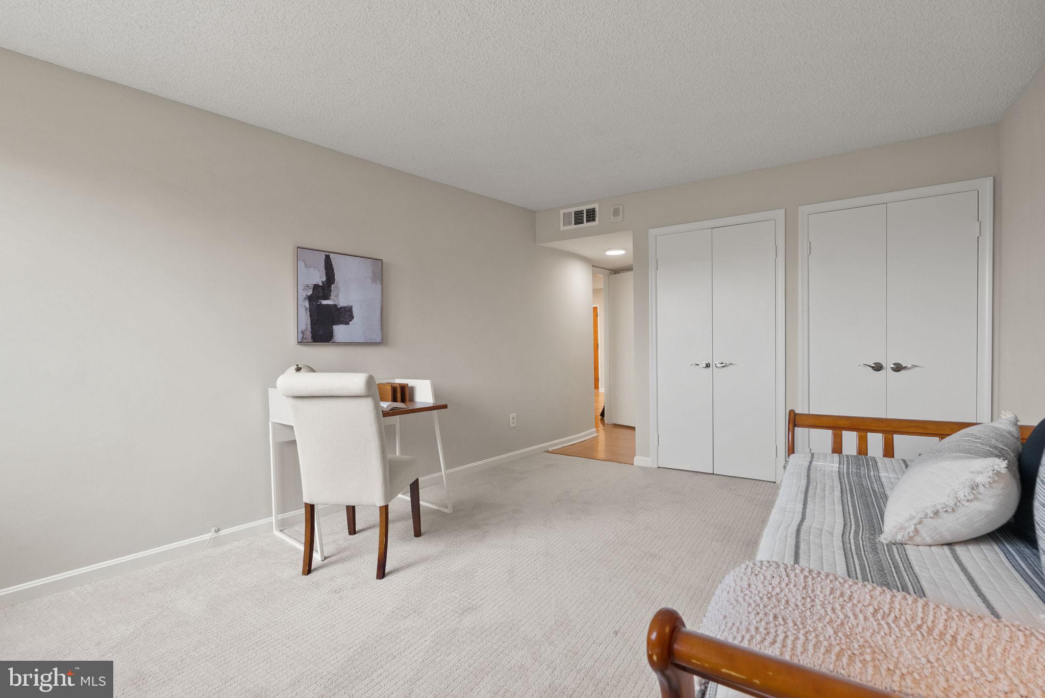 1101 South Arlington Ridge Road, Unit 313 Arlington, VA 22202 - Photo 24 of 59 a living room with furniture