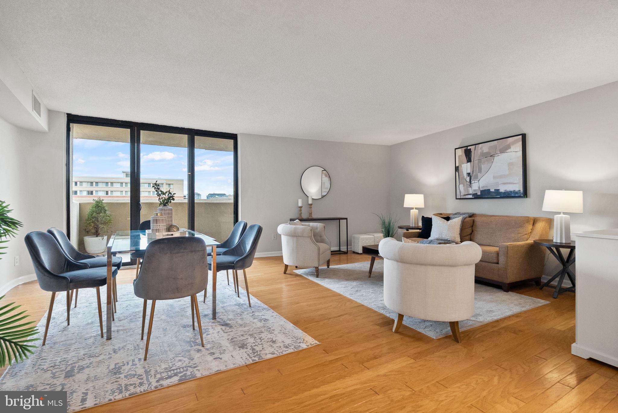 1101 South Arlington Ridge Road, Unit 313 Arlington, VA 22202 - Photo 59 of 59 a living room with furniture and a large window