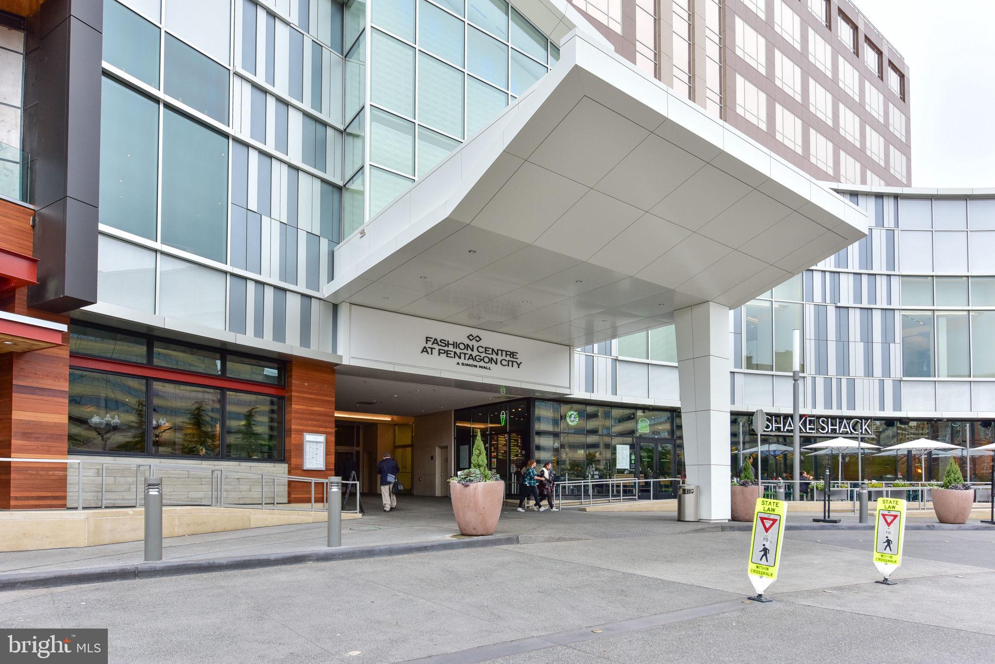 1101 South Arlington Ridge Road, Unit 313 Arlington, VA 22202 - Photo 57 of 59 a view of a building with sitting area