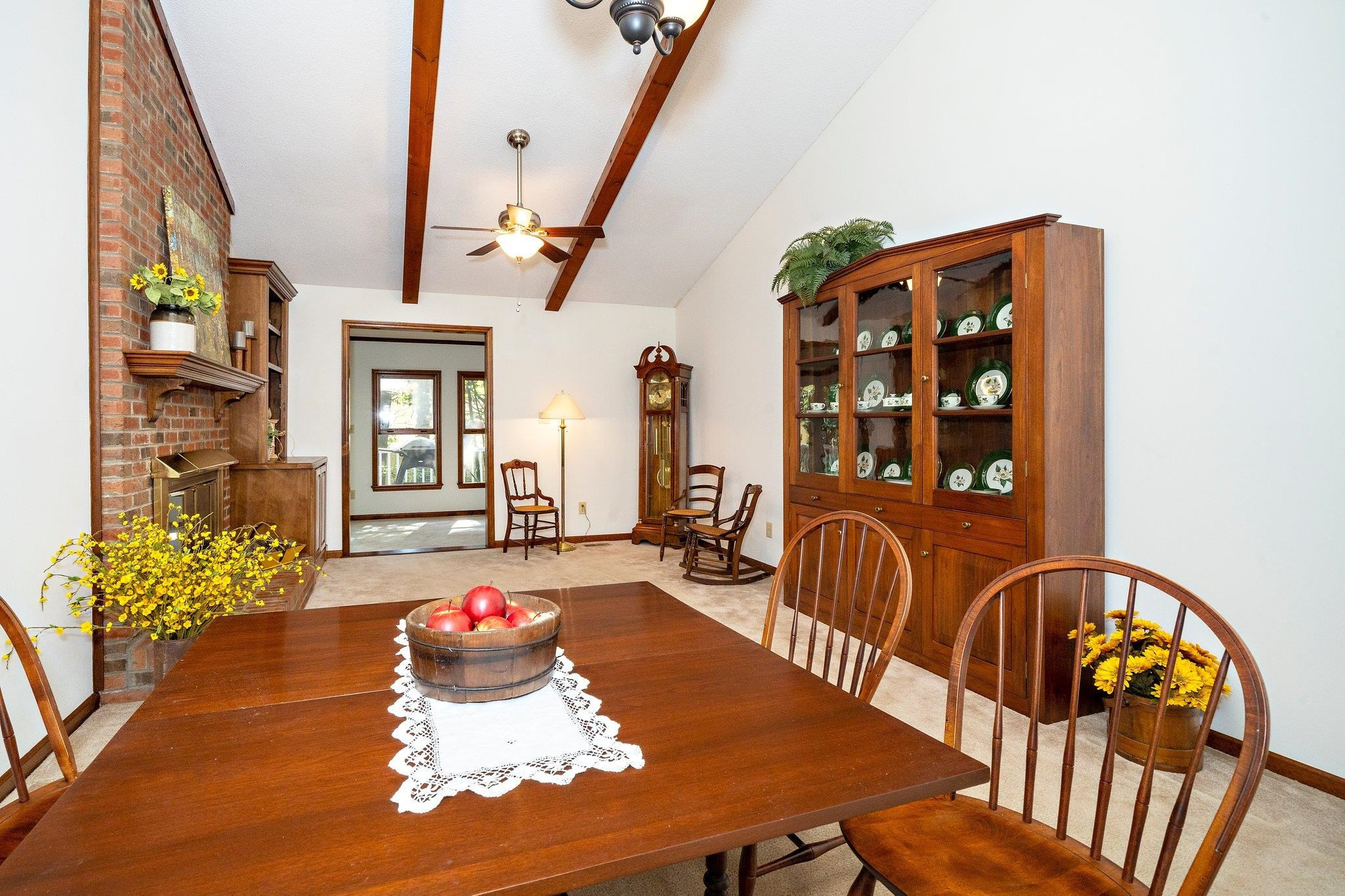 902 Bridge Way Raleigh, NC 27615 - Photo 9 of 27 a living room with furniture and a potted plant