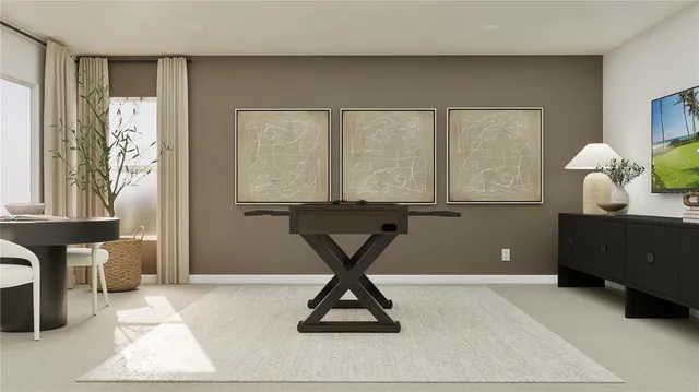 a living room with a table and a window