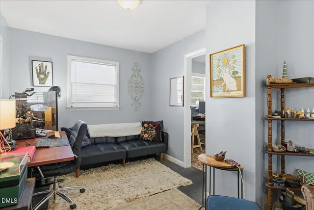 a room with furniture and a window