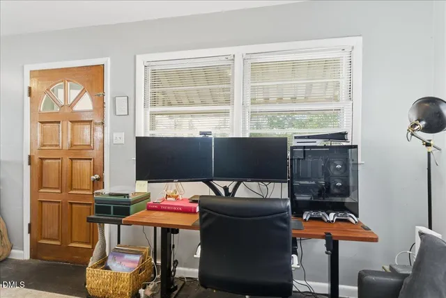 a view of a house with a large window