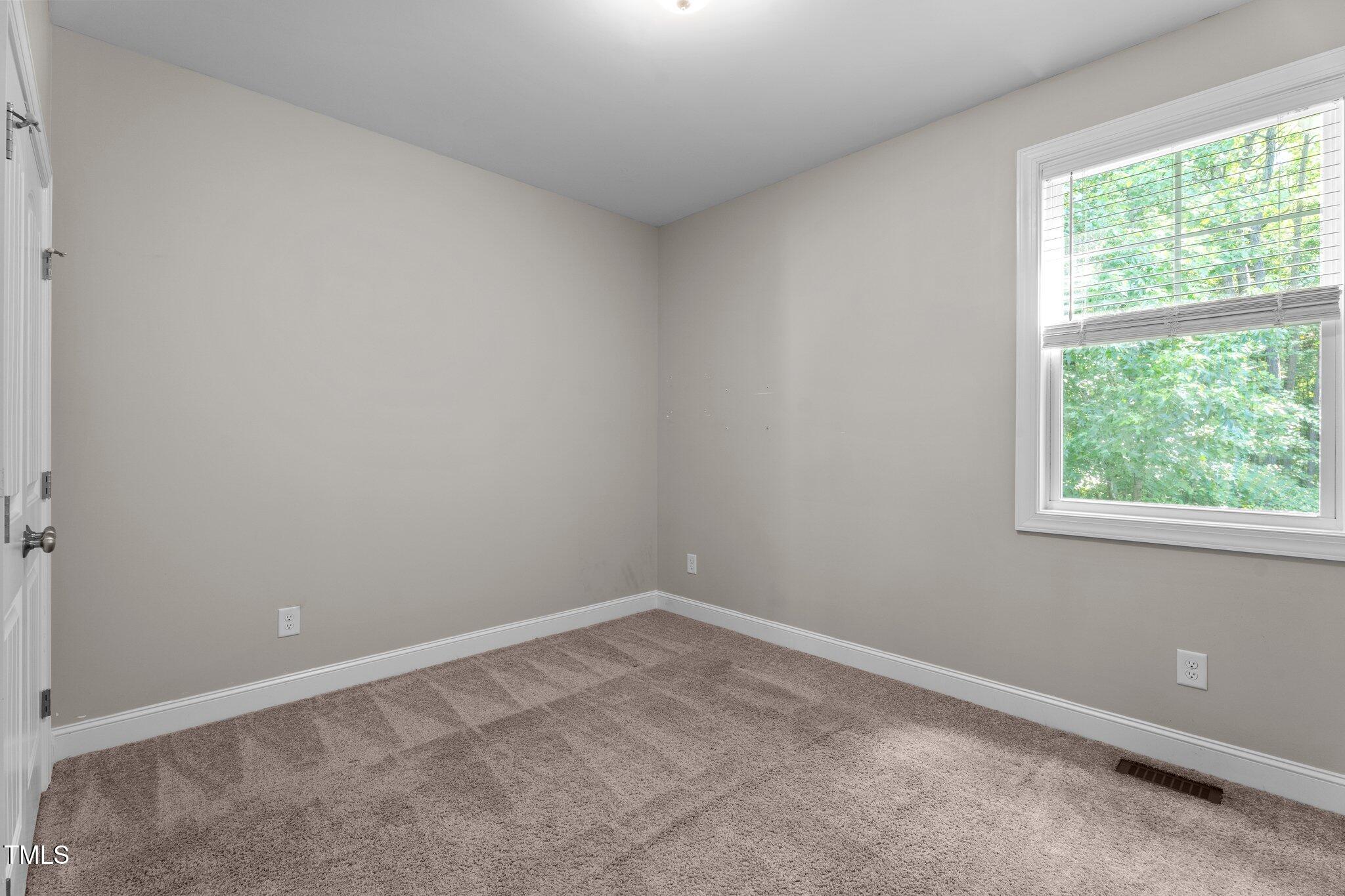 46 Trusting Lane Middlesex, NC 27557 - Photo 28 of 35 an empty room with a window