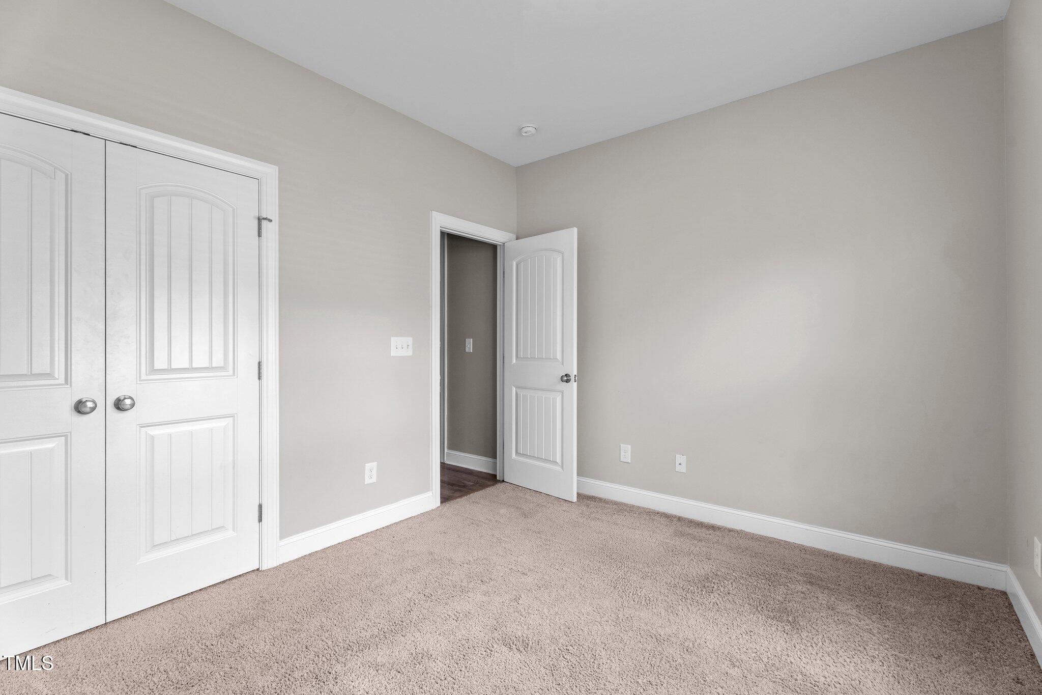 46 Trusting Lane Middlesex, NC 27557 - Photo 32 of 35 a view of an empty room and closet area