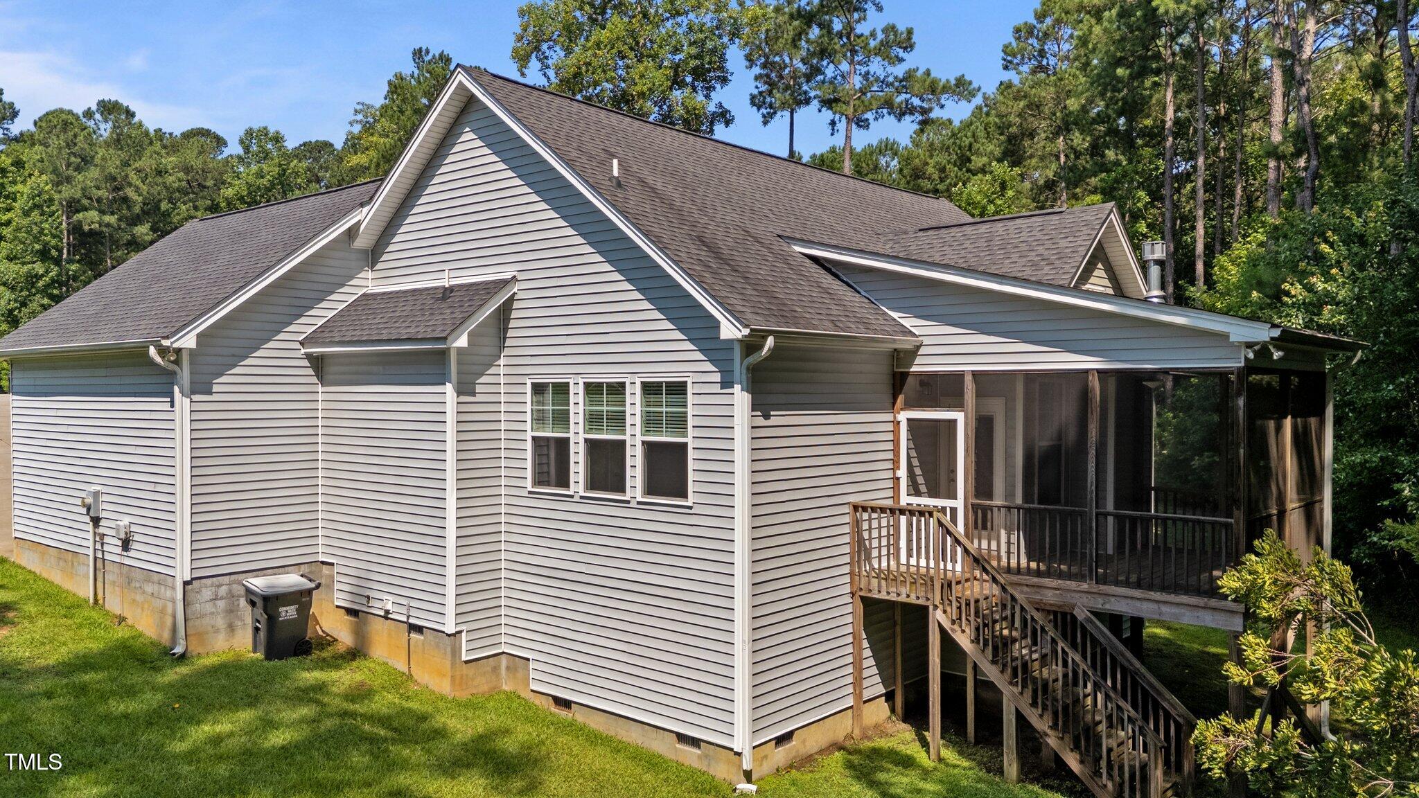 46 Trusting Lane Middlesex, NC 27557 - Photo 8 of 35 a view of a house with a yard and wooden fence