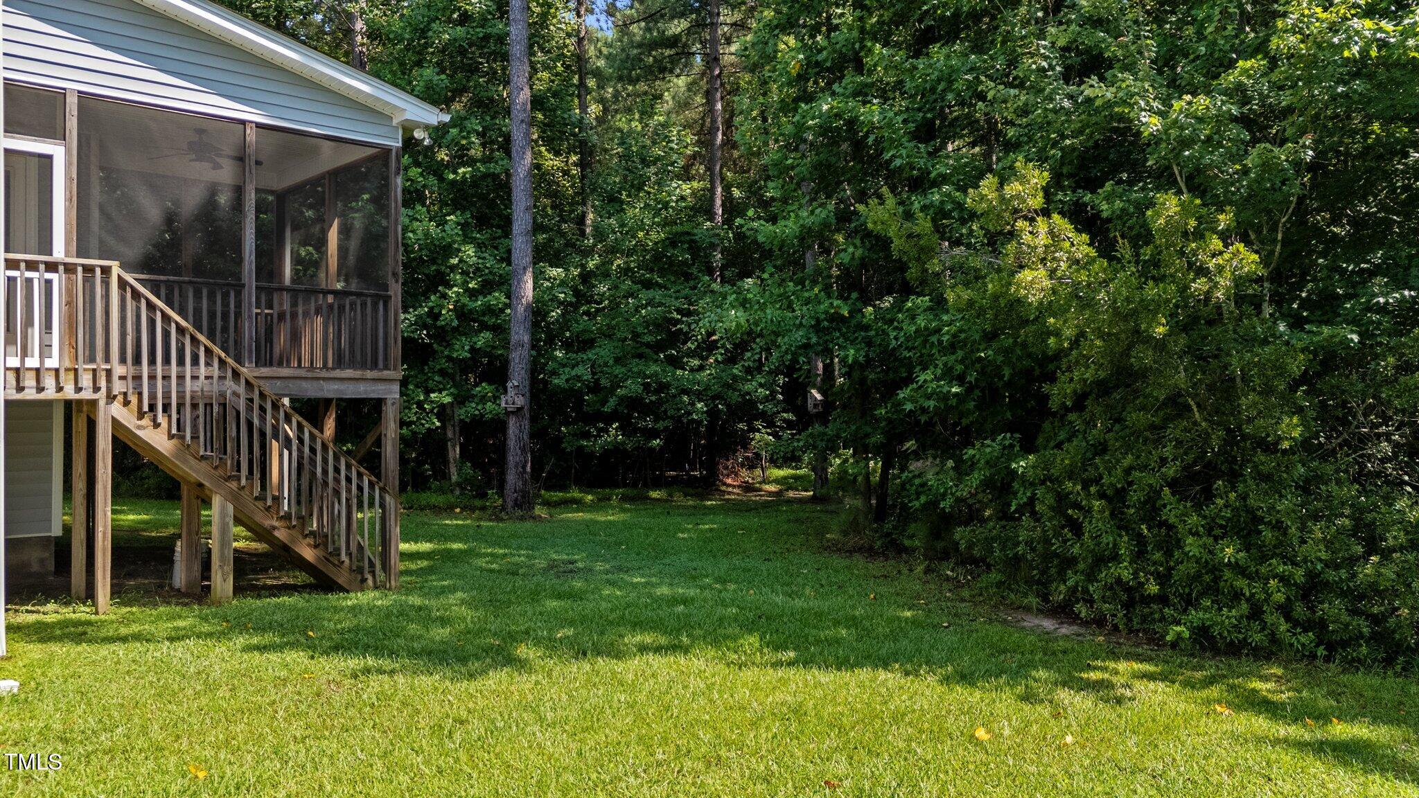 46 Trusting Lane Middlesex, NC 27557 - Photo 9 of 35 a view of a house with backyard