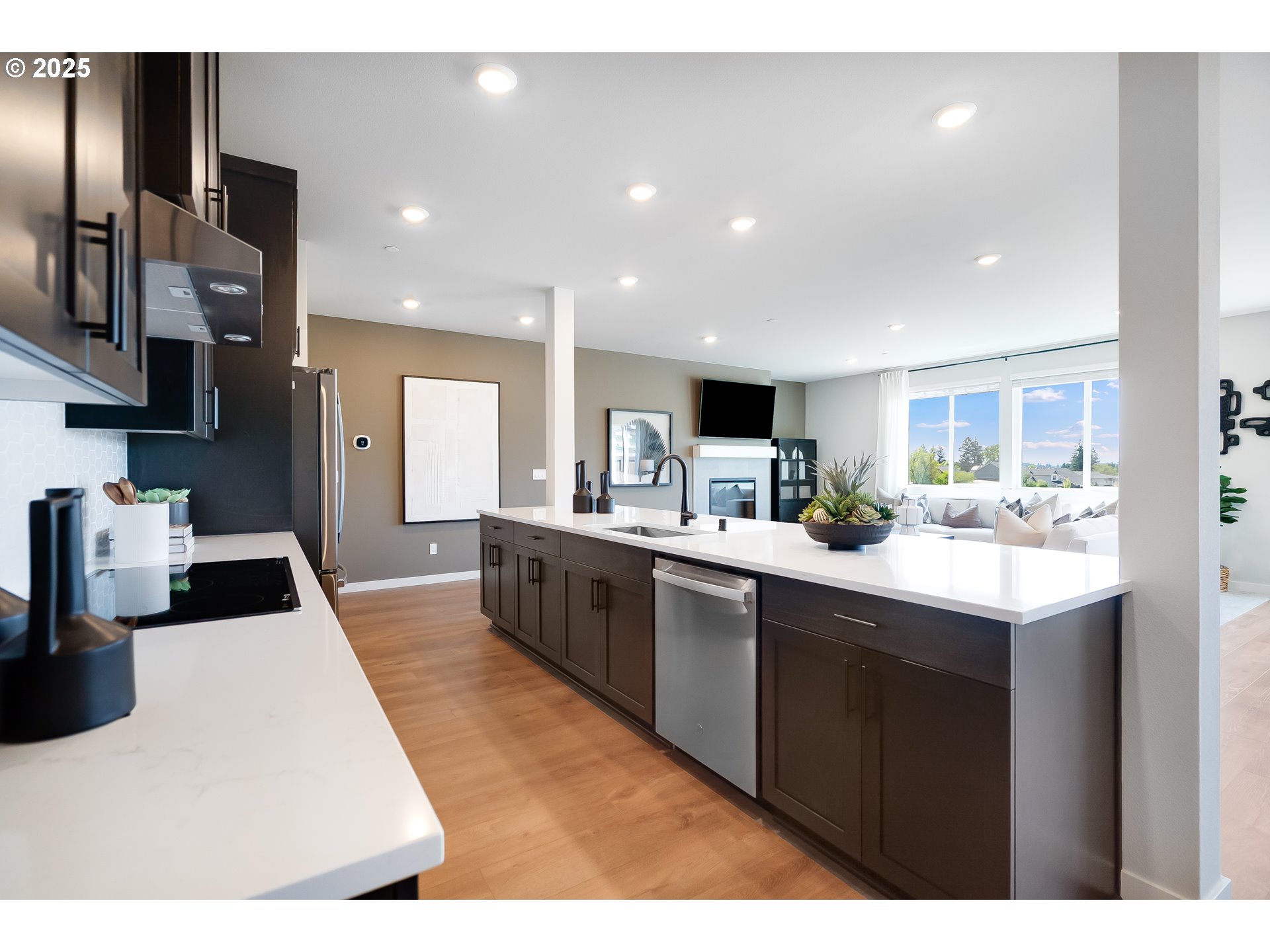 5269 North 87th Avenue Camas, WA 98607 - Photo 13 of 48 a kitchen with stainless steel appliances kitchen island granite countertop a sink and cabinets