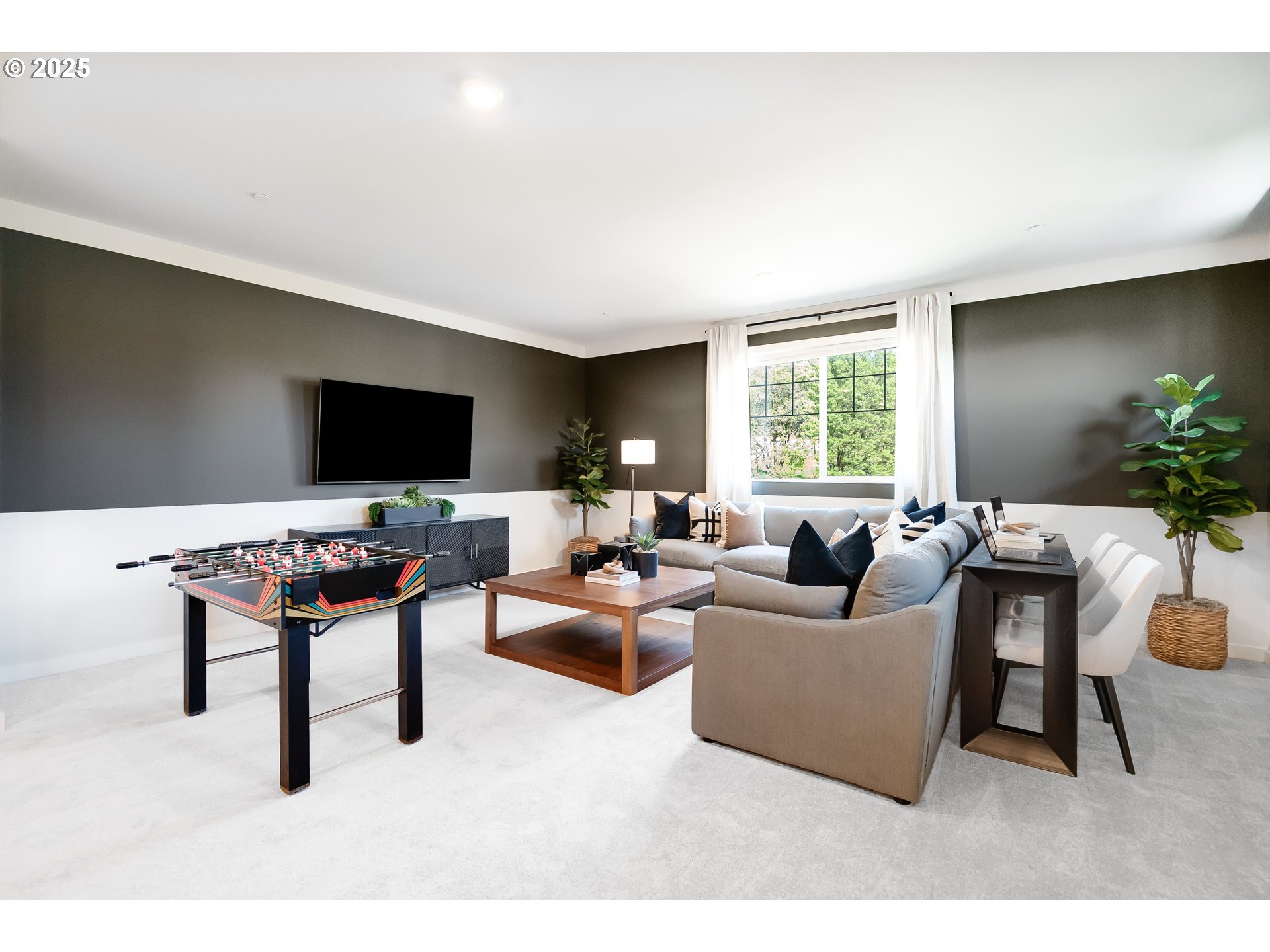 5269 North 87th Avenue Camas, WA 98607 - Photo 34 of 48 a living room with furniture and a flat screen tv
