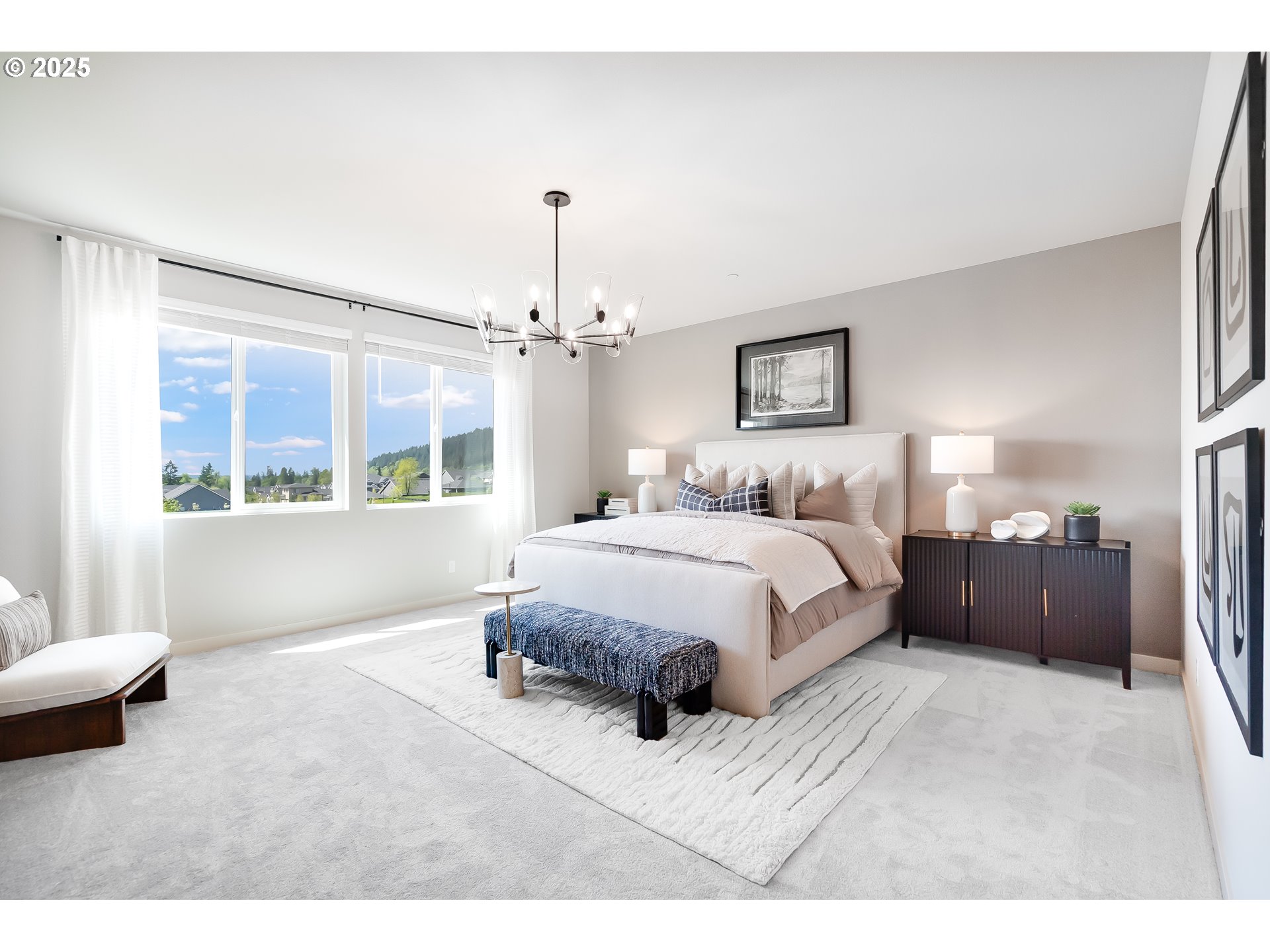 5269 North 87th Avenue Camas, WA 98607 - Photo 40 of 48 a spacious bedroom with a bed mirror and window
