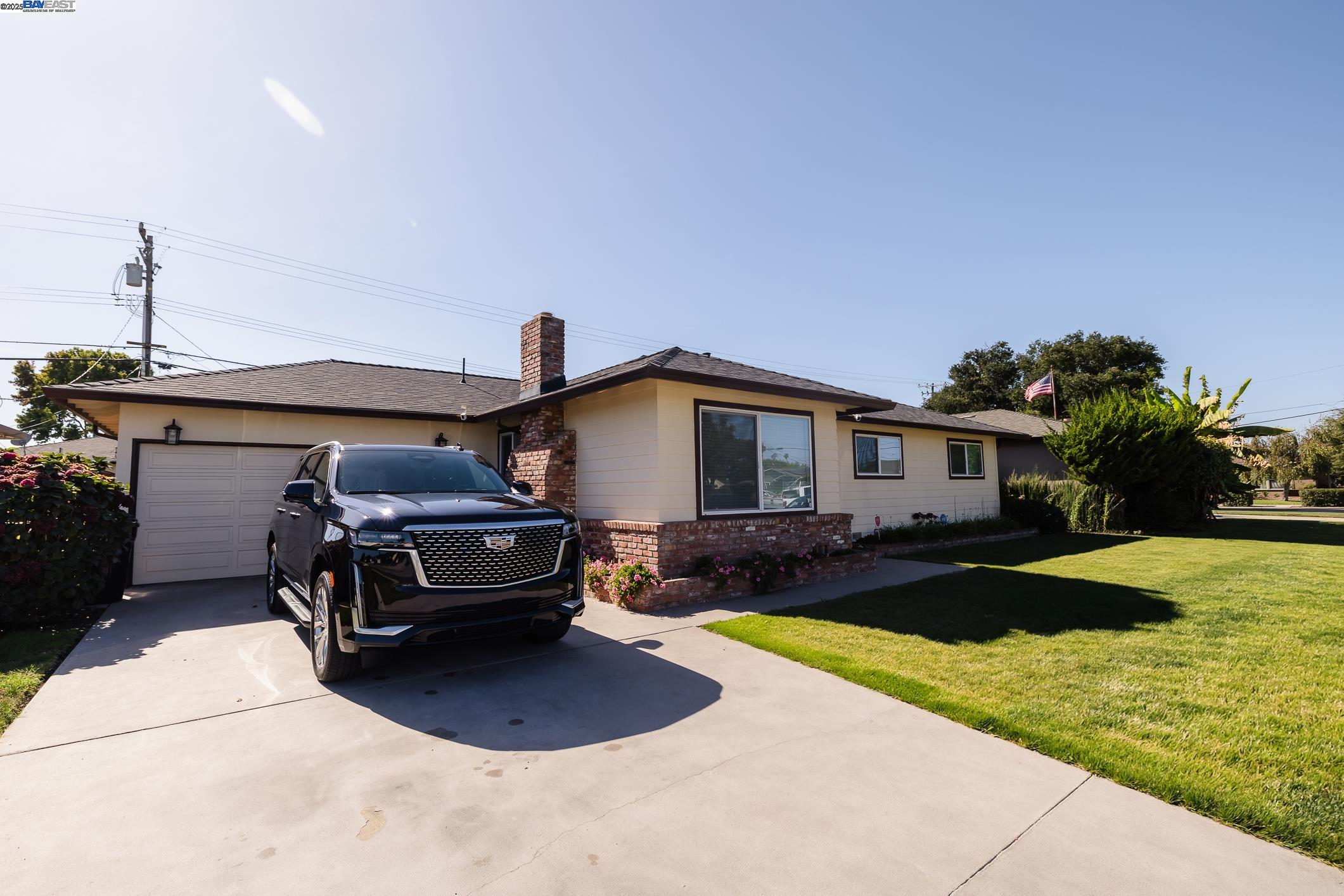 a car parked in front of a house
