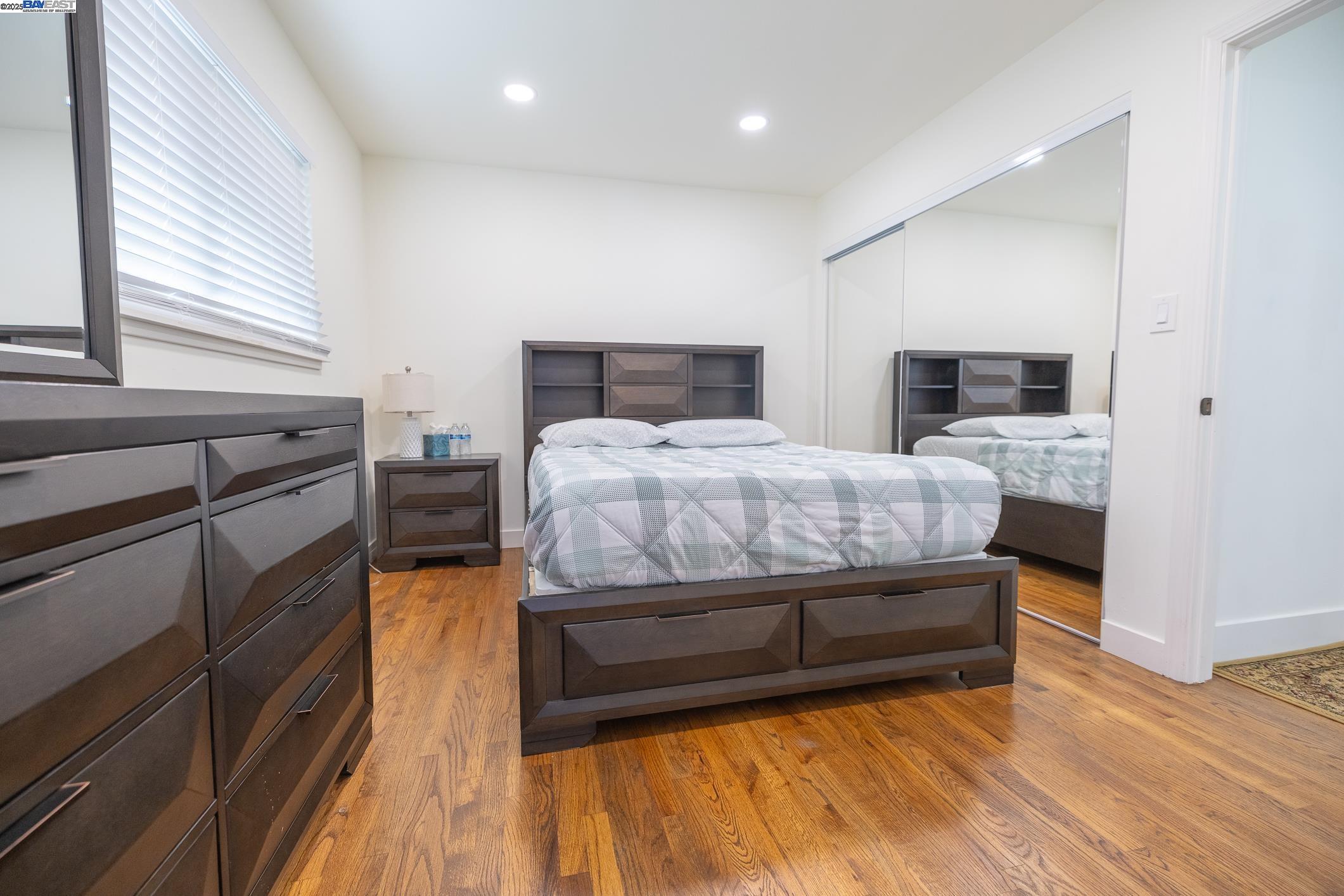 767 Lemos Avenue Salinas, CA 93901 - Photo 23 of 60 a bedroom with a bed and flat screen tv
