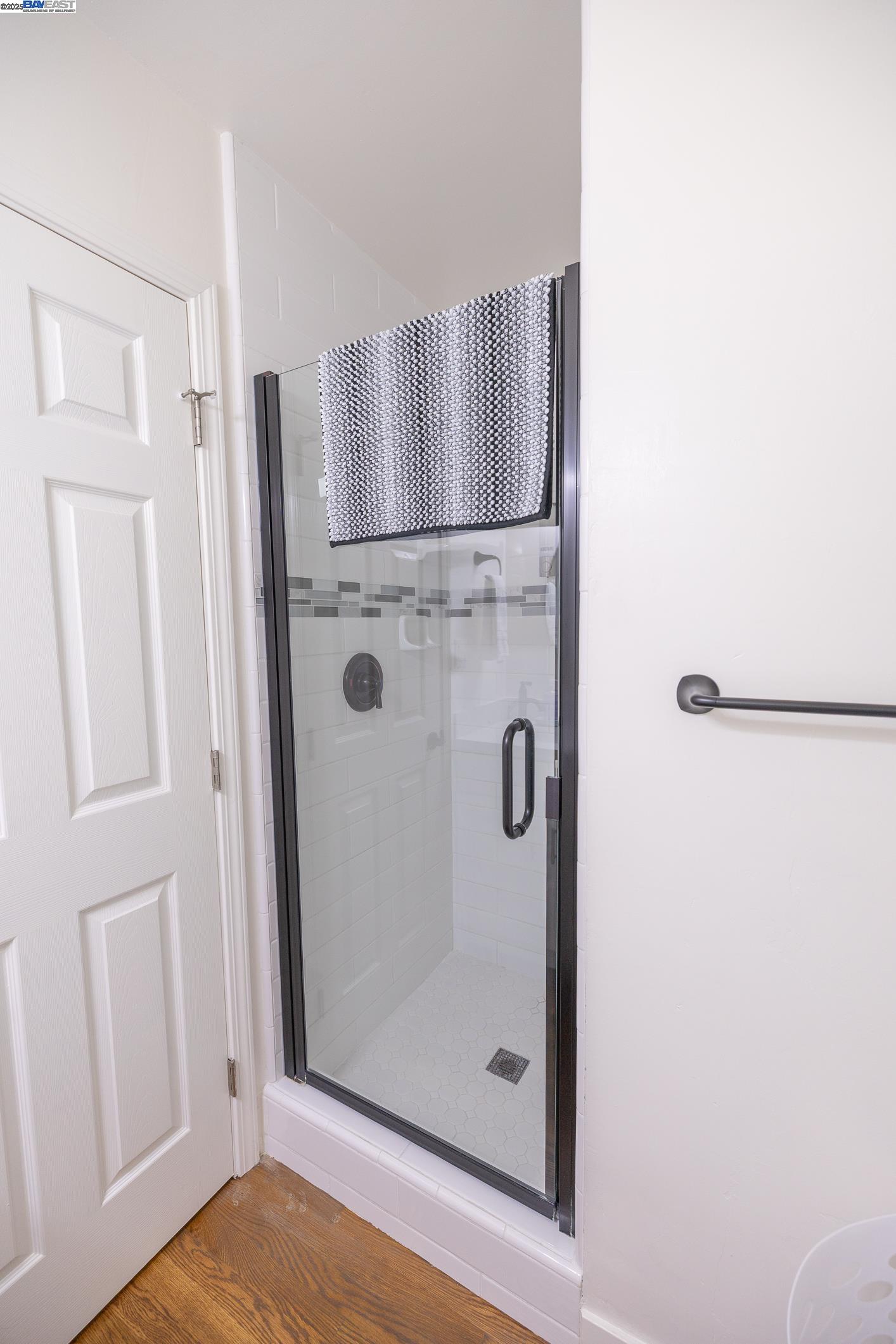 767 Lemos Avenue Salinas, CA 93901 - Photo 26 of 60 a bathroom with a glass shower door