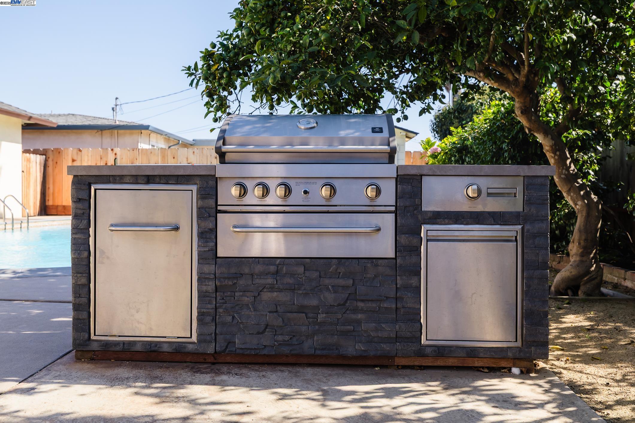 767 Lemos Avenue Salinas, CA 93901 - Photo 45 of 60 Enjoy a true California backyard with a refreshing pool, built-in BBQ island & seamless access to the enclosed sunroom. Ideal for relaxing, hosting or family gatherings, surrounded by fruit trees & generous patio space.