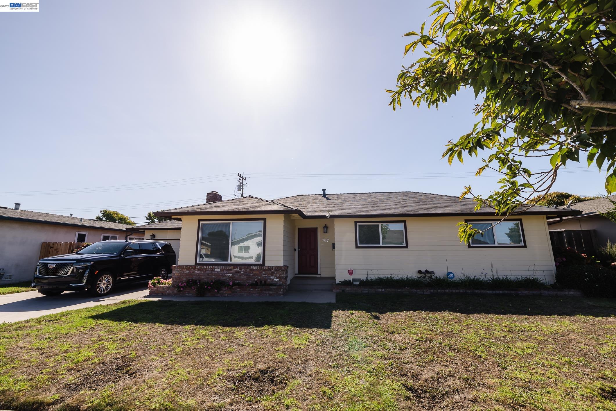 767 Lemos Avenue Salinas, CA 93901 - Photo 6 of 60 a front view of a house with a yard