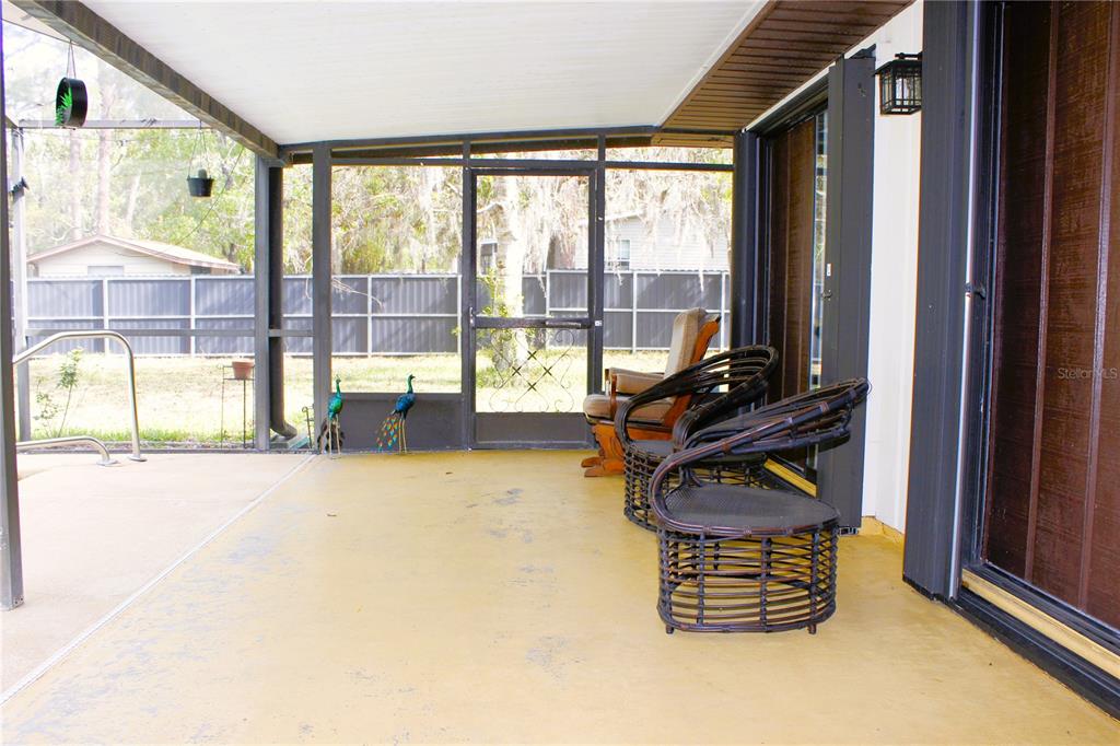 3201 Bartlett Street Spring Hill, FL 34606 - Photo 31 of 45 a gym room with large windows
