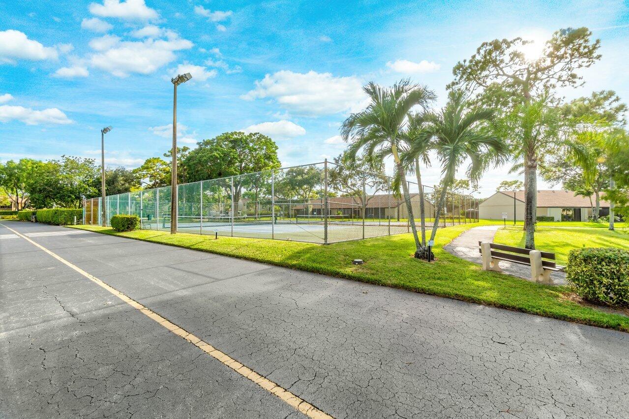 603 Sea Pine Way, Unit E3 Greenacres, FL 33415 - Photo 18 of 22 a view of a park with slide