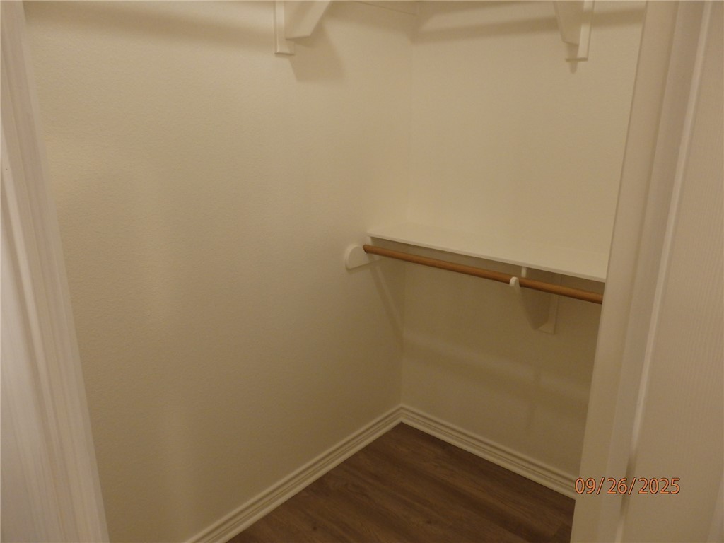 3717 Dove Crossing Lane College Station, TX 77845 - Photo 13 of 27 Spacious closet with dark wood-style floors