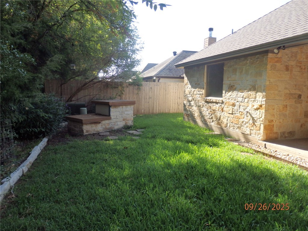 3717 Dove Crossing Lane College Station, TX 77845 - Photo 23 of 27 View of yard featuring a patio