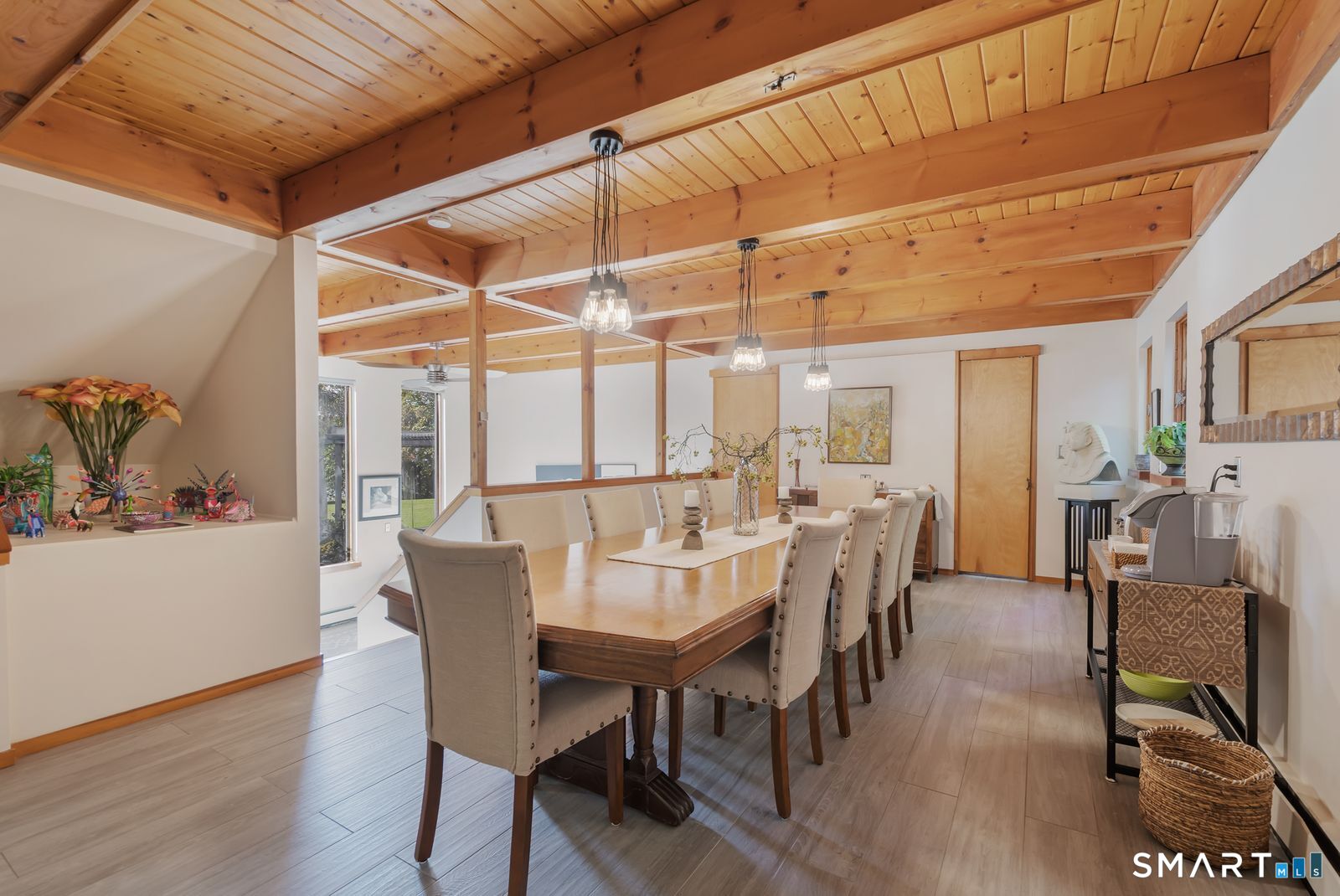 106 Hunt Road Columbia, CT 06237 - Photo 28 of 40 a view of a dining room with furniture window and wooden floor