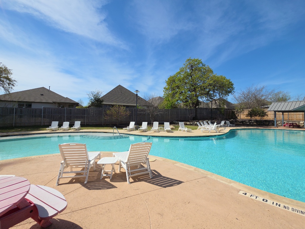13208 Mariscan Street Manchaca, TX 78652 - Photo 29 of 31 Community pool with a patio area