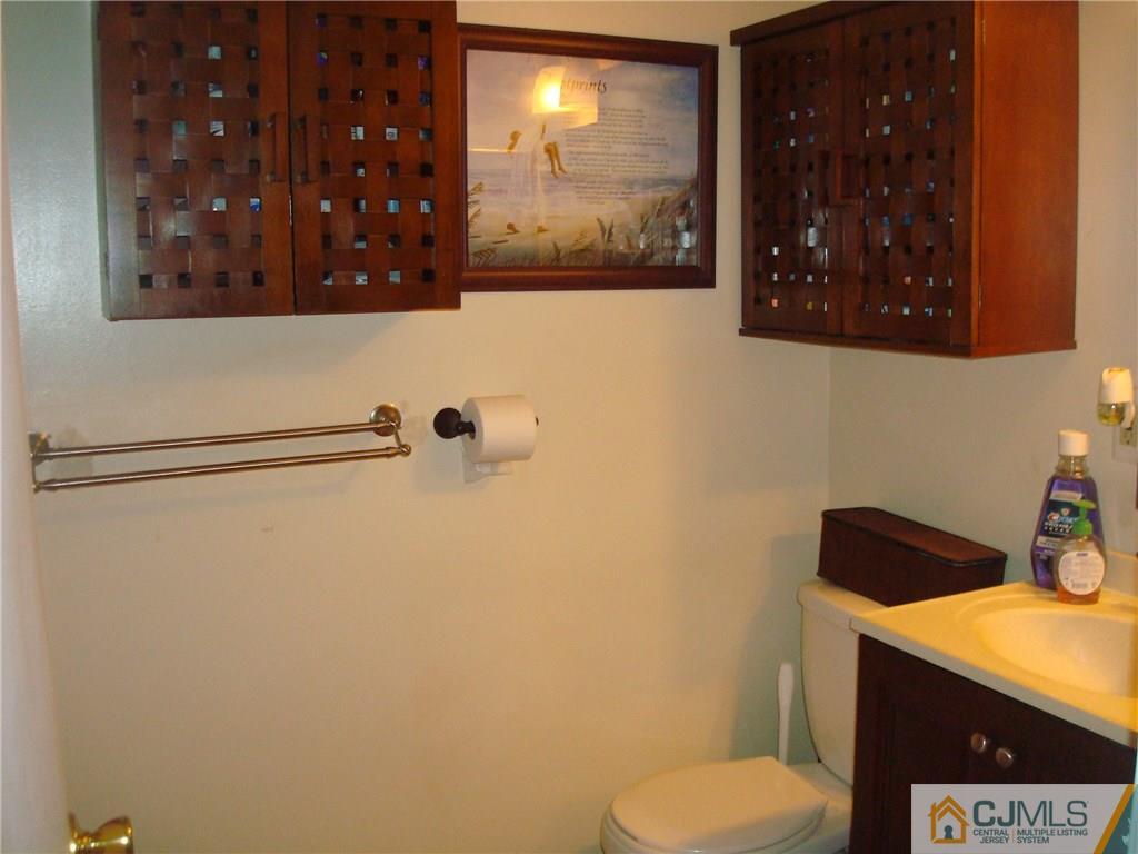 317 Edpas Road, Unit 317 New Brunswick, NJ 08901 - Photo 7 of 9 a bathroom with a toilet and a shower