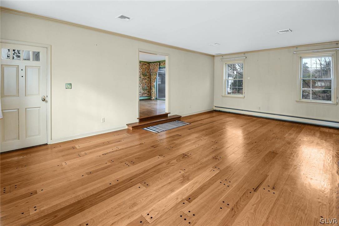 1655 White Acre Drive Bethlehem, PA 18015 - Photo 16 of 39 a view of an empty room with wooden floor and a window