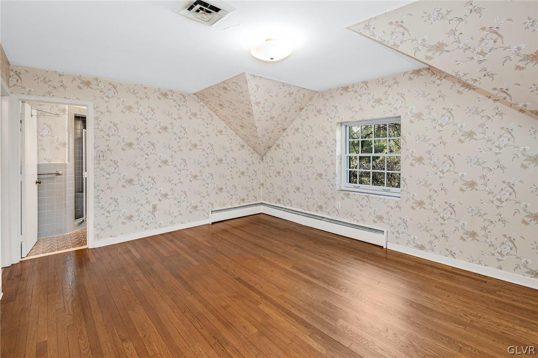1655 White Acre Drive Bethlehem, PA 18015 - Photo 20 of 39 an empty room with wooden floor and windows