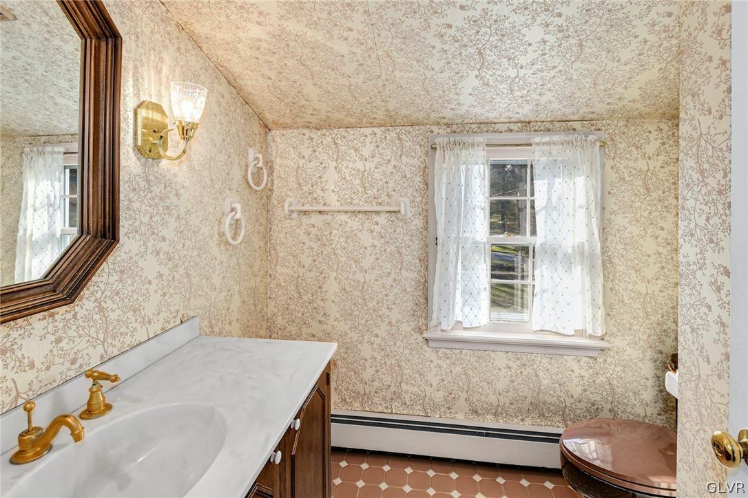 1655 White Acre Drive Bethlehem, PA 18015 - Photo 26 of 39 a bathroom with a sink and a mirror