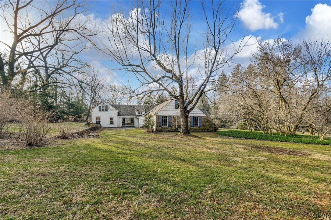 1655 White Acre Drive Bethlehem, PA 18015 - Photo 30 of 39 a brick house with trees in front of it