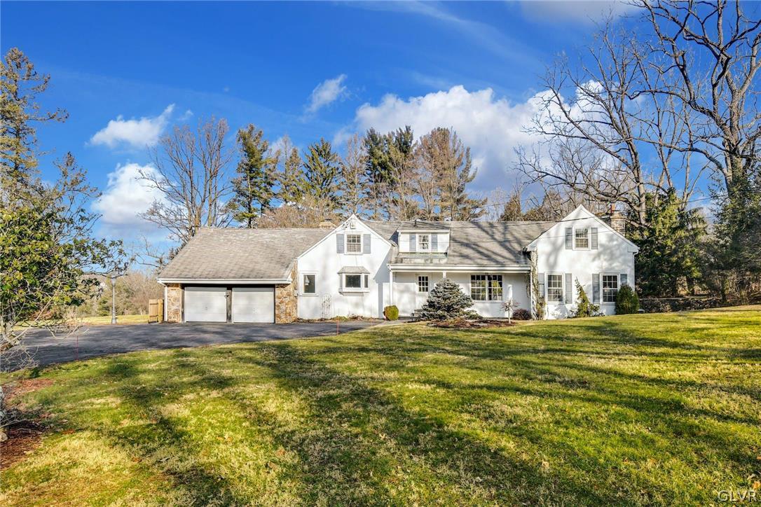 1655 White Acre Drive Bethlehem, PA 18015 - Photo 6 of 39 a front view of a house with a garden