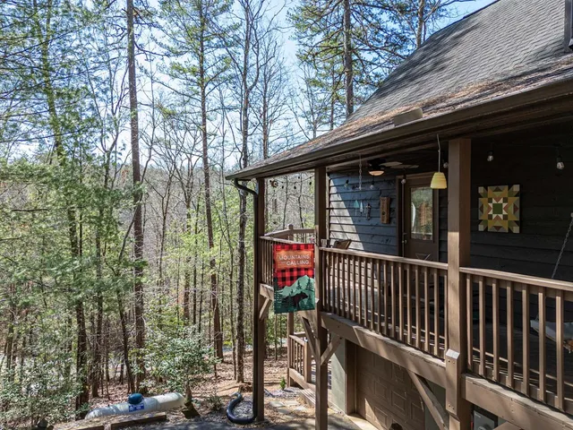 a view of a forest with a house